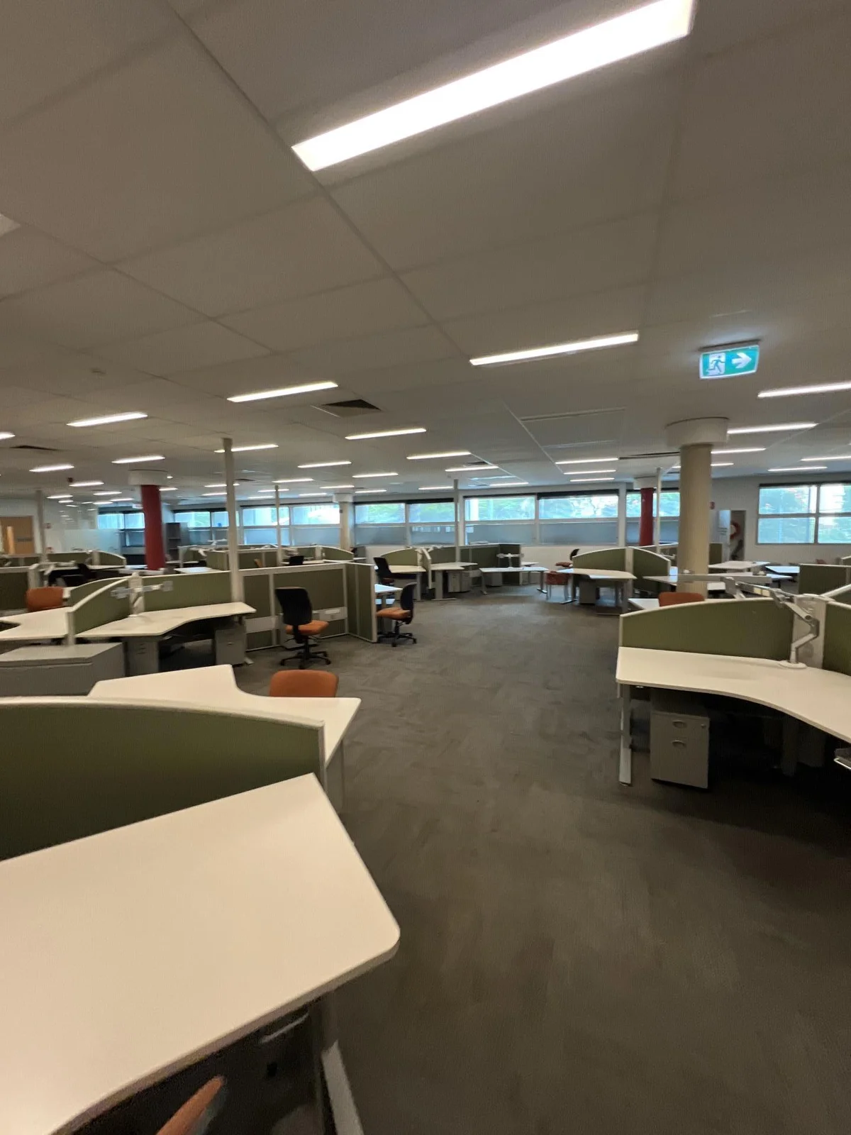 A wider office view at the final attendance on 16 May, after drying equipment was removed. Ceiling repairs remained outstanding.