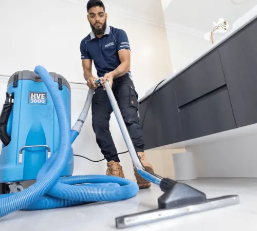 Water damage Sydney technician performing flood damage restoration